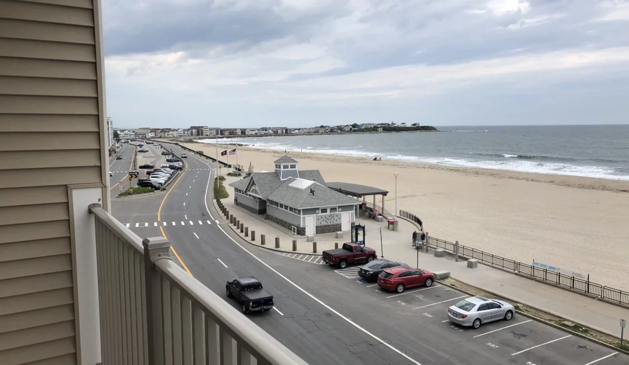 a view of a beach from a balcony.