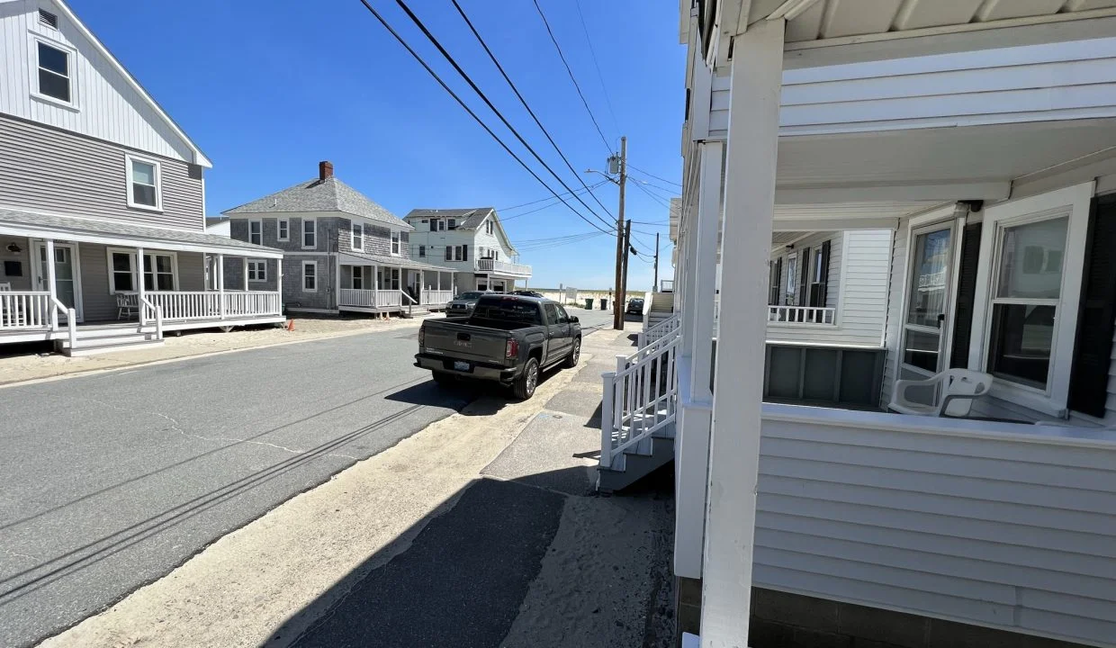 a truck is parked on the side of the road.