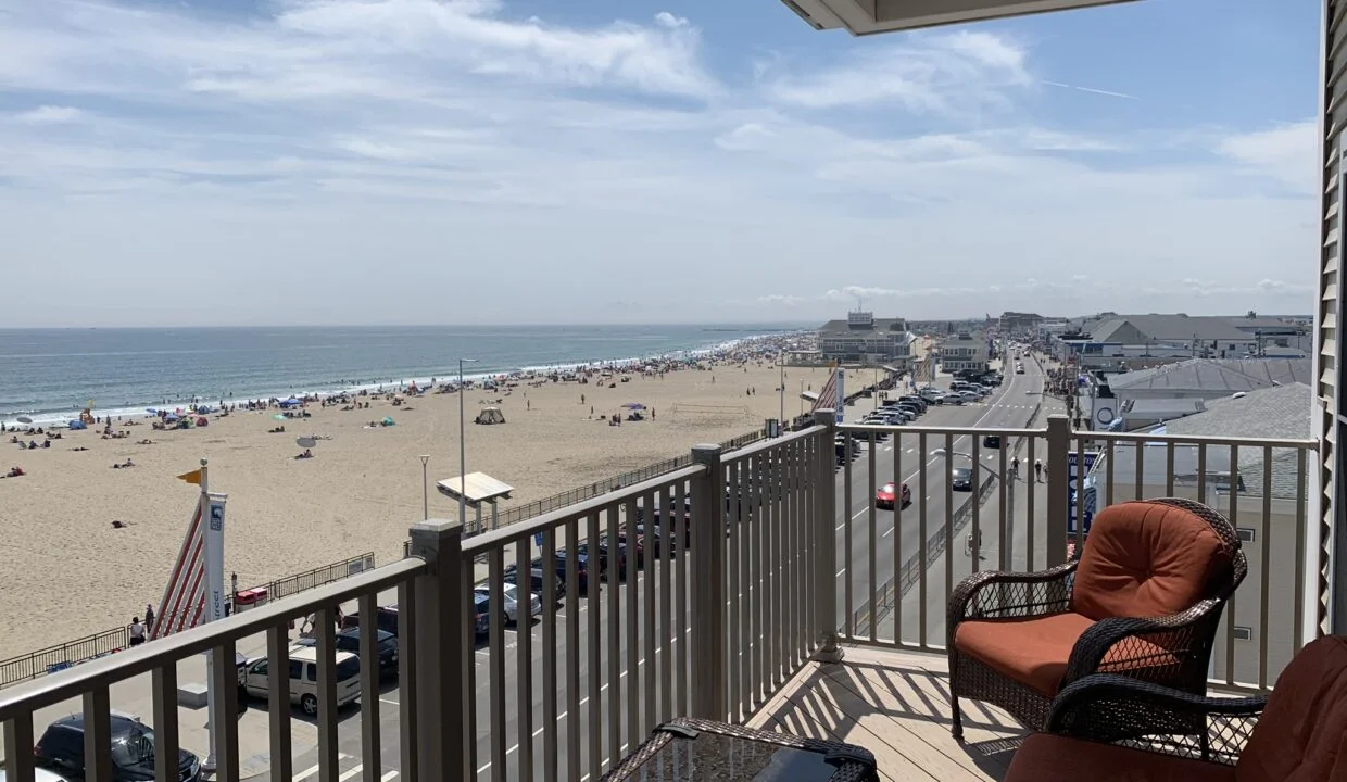 a view of a beach from a balcony.