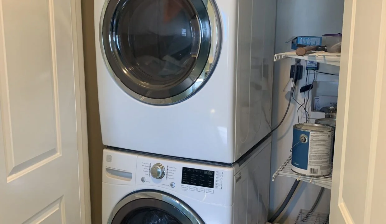 a washer and dryer in a small room.