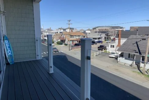 a view of a town from a balcony.