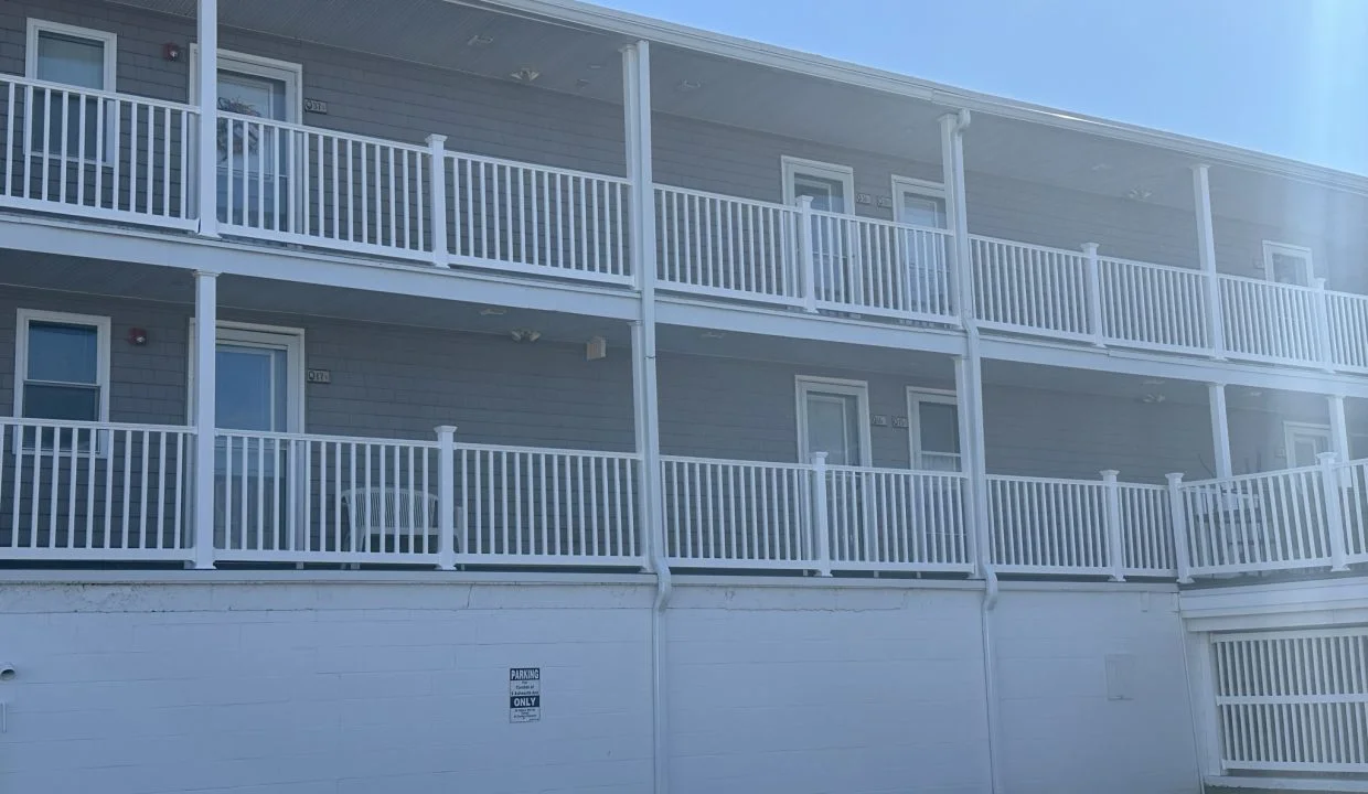 an apartment building with balconies and balconies on the balconies.