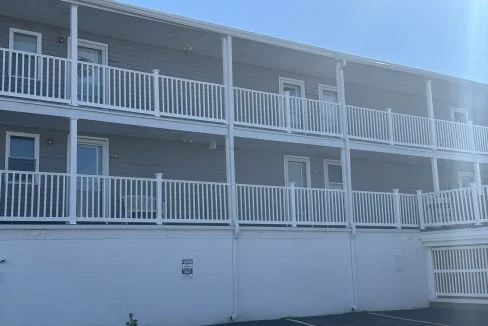 an apartment building with balconies and balconies on the balconies.