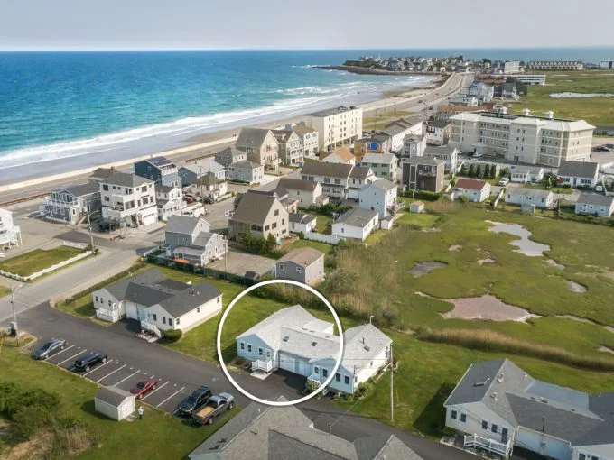 an aerial view of a beach front neighborhood.